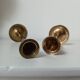 Set of two straight brass candlesticks.