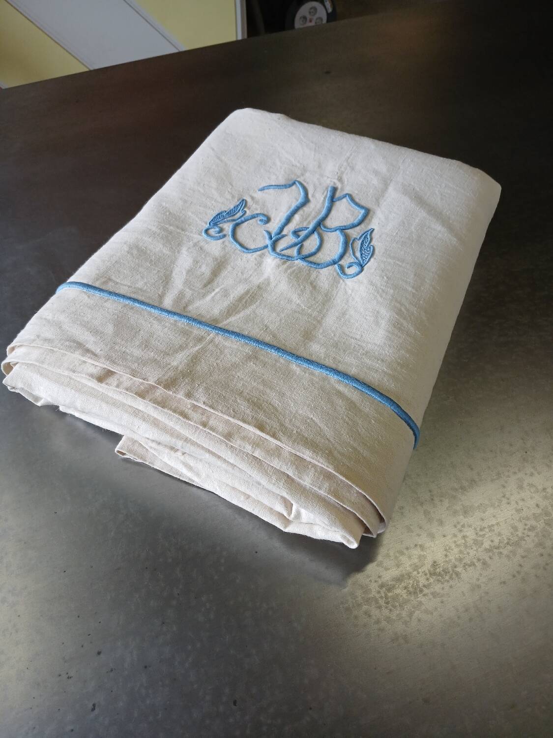 Antique linen sheet with JB embroidery