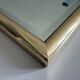 Rectangular wall mirror with a gold metal frame by Schöninger, 1970s, Germany.