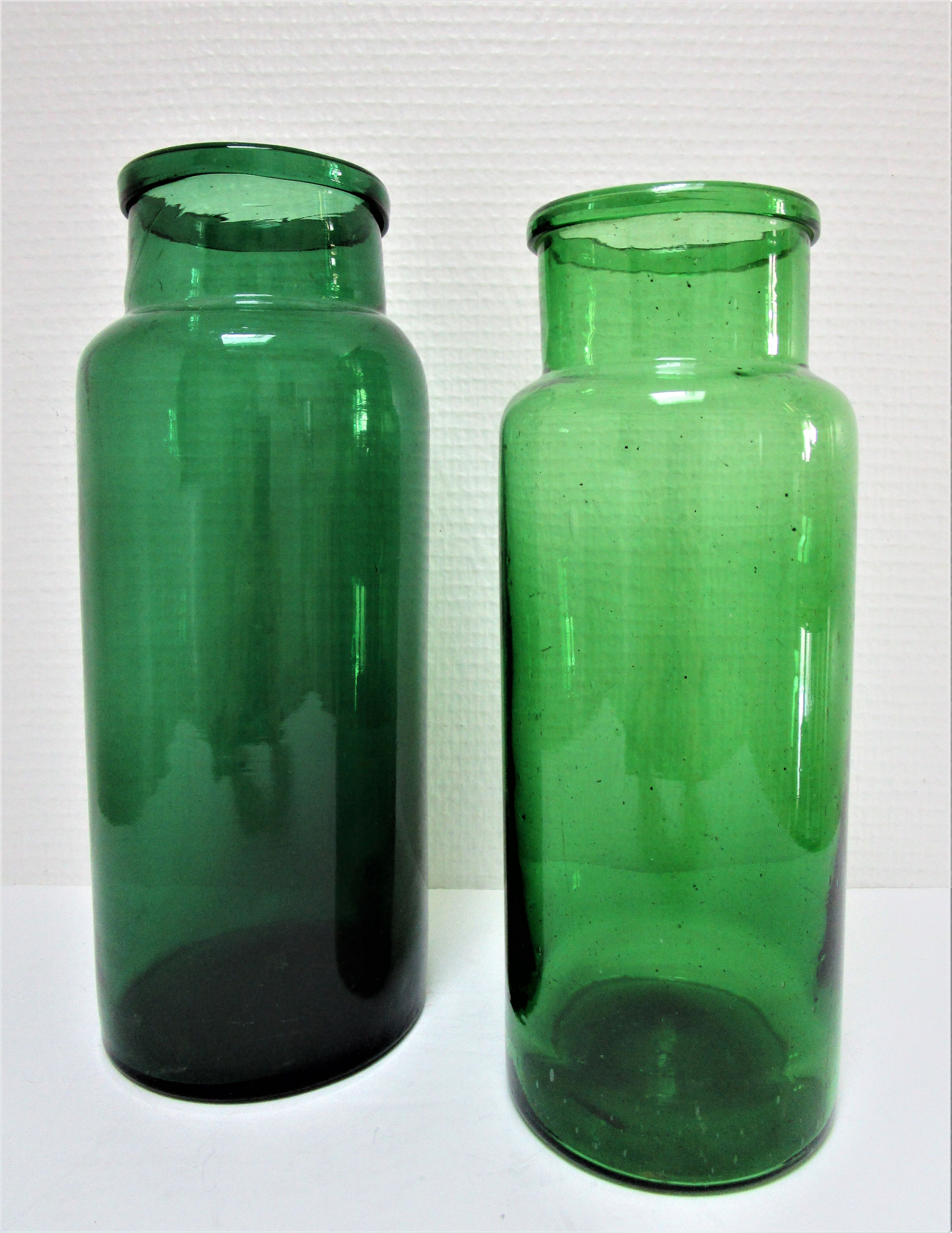 Two old green blown glass jars early 20th century