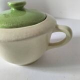 Two sugar bowls and a textured plate in turquoise and green Salins earthenware.