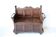 Antique brown oak bench with storage chest and panelled carved backrest.