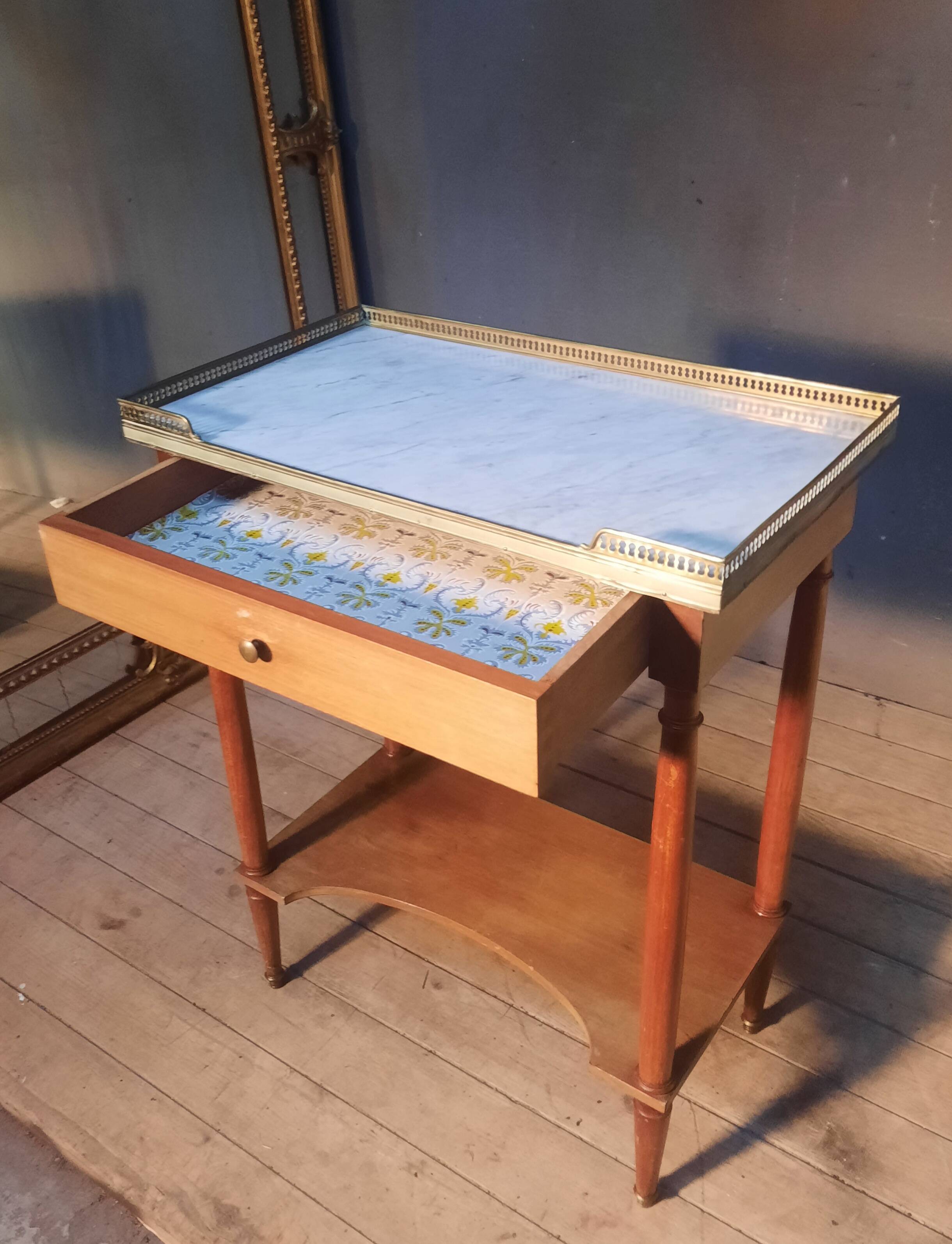 Side table in Louis XVI style.