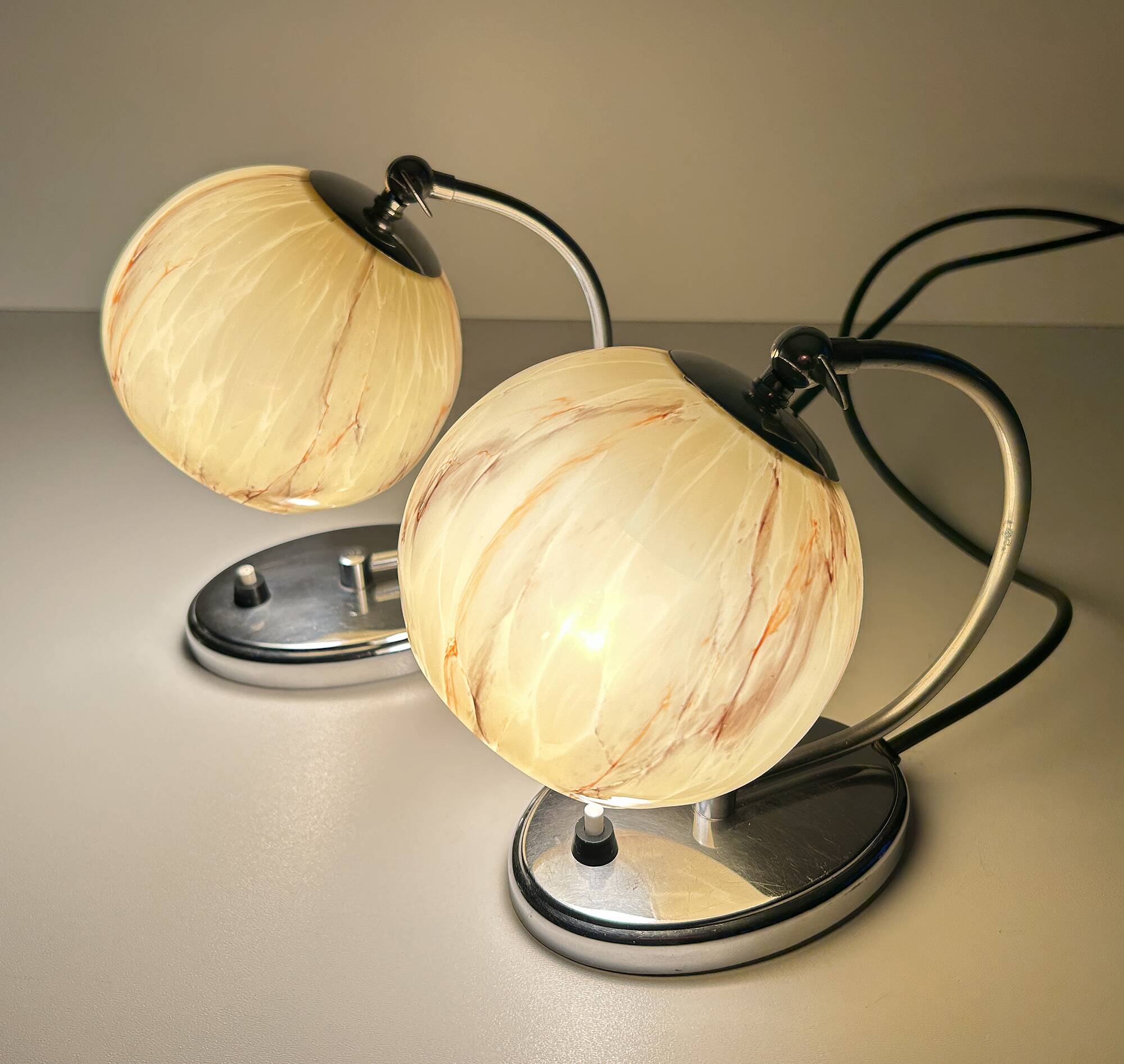 Pair of art deco lamps, chrome glass