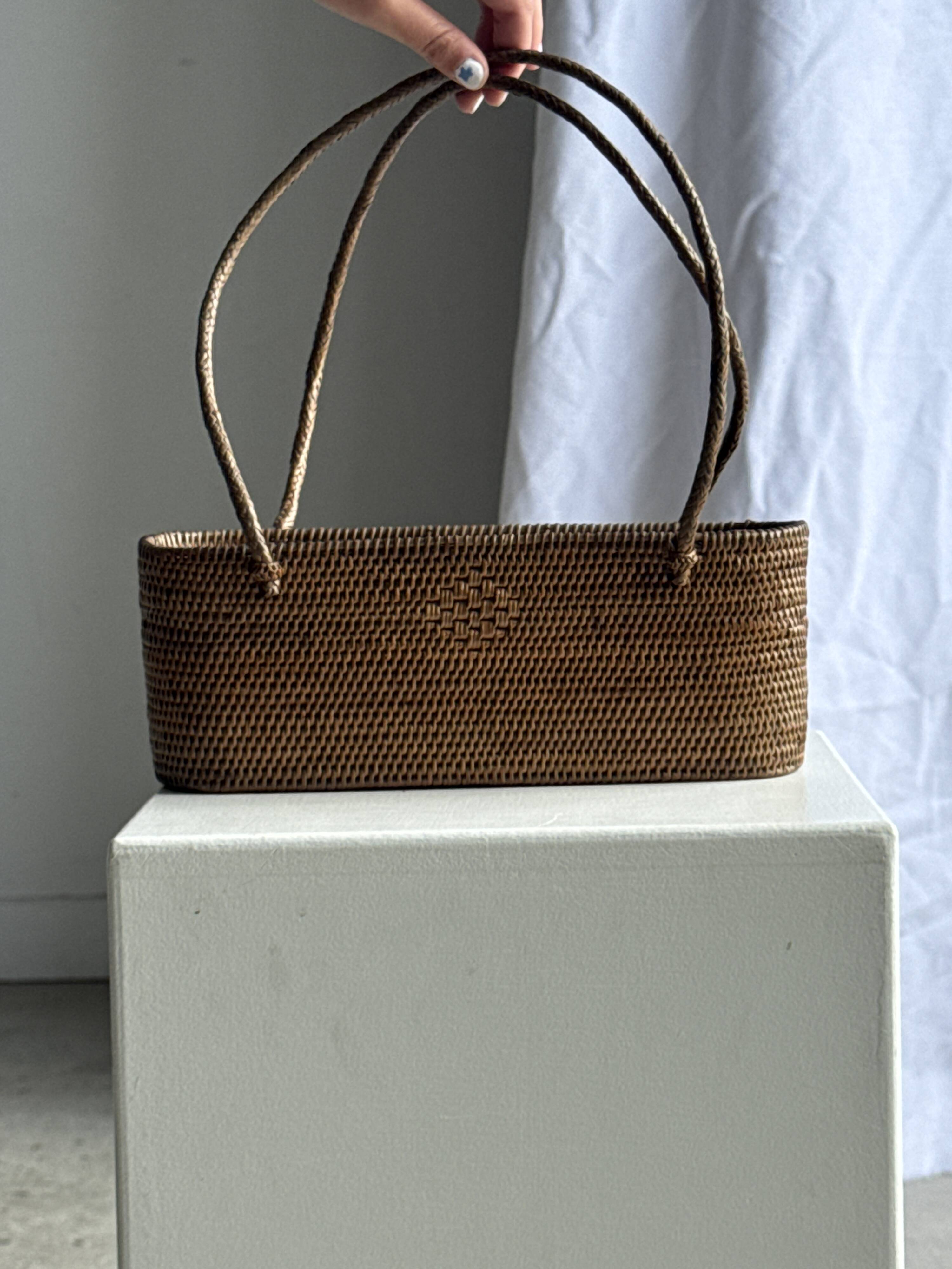 Small oval basket with long handles, traditional Indonesian L28xH10