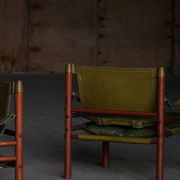 Arne Norell, Pair of "Sirocco" Safari armchairs in ash and green leather, 1960s.