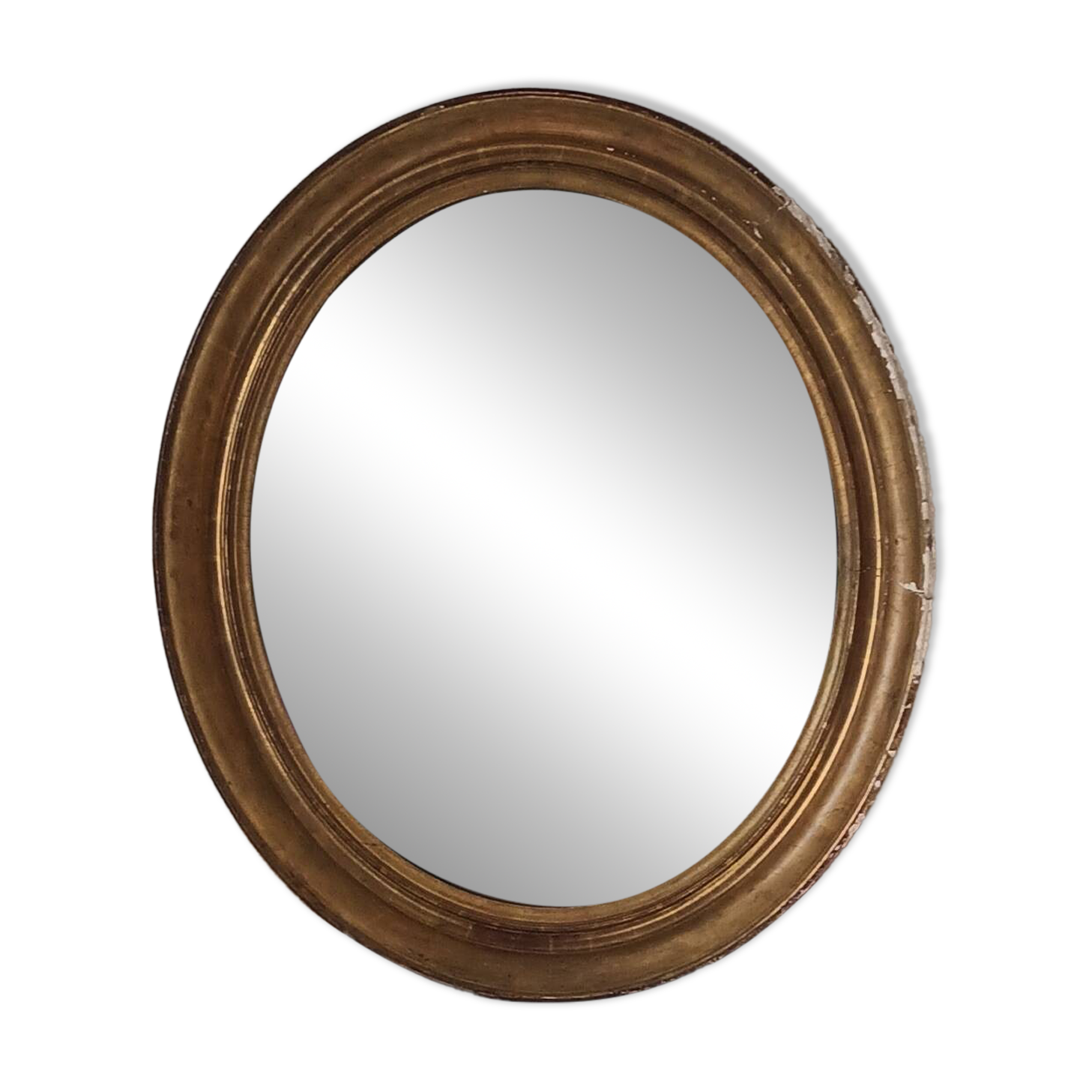 Antique oval gilded stucco mirror