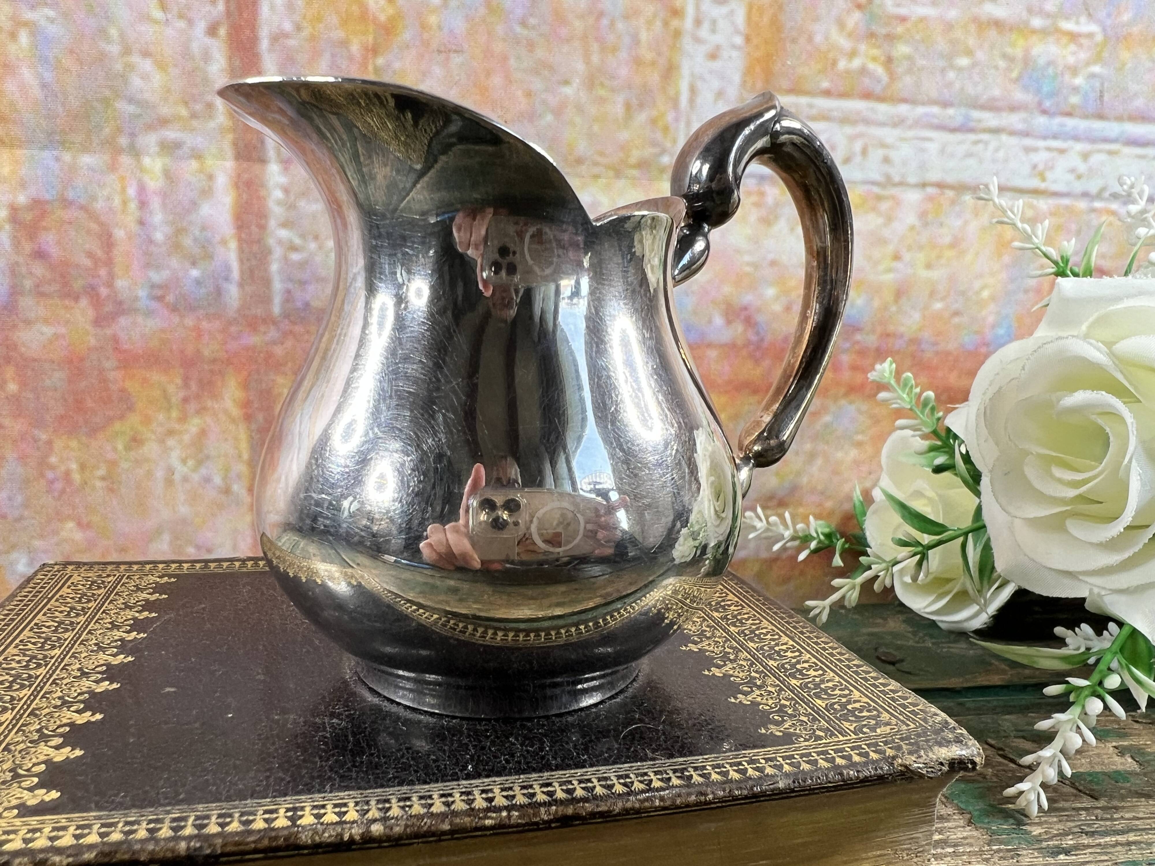 Small Christofle silver-plated metal ewer – Baluster model – France, 20th century