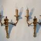 Pair of neoclassical sconces in bronze and gilded brass 1950.