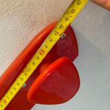 Orange/red plastic hooks year 60