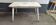 Large white Tolix table in vintage metal, 120 cm x 70.5 cm