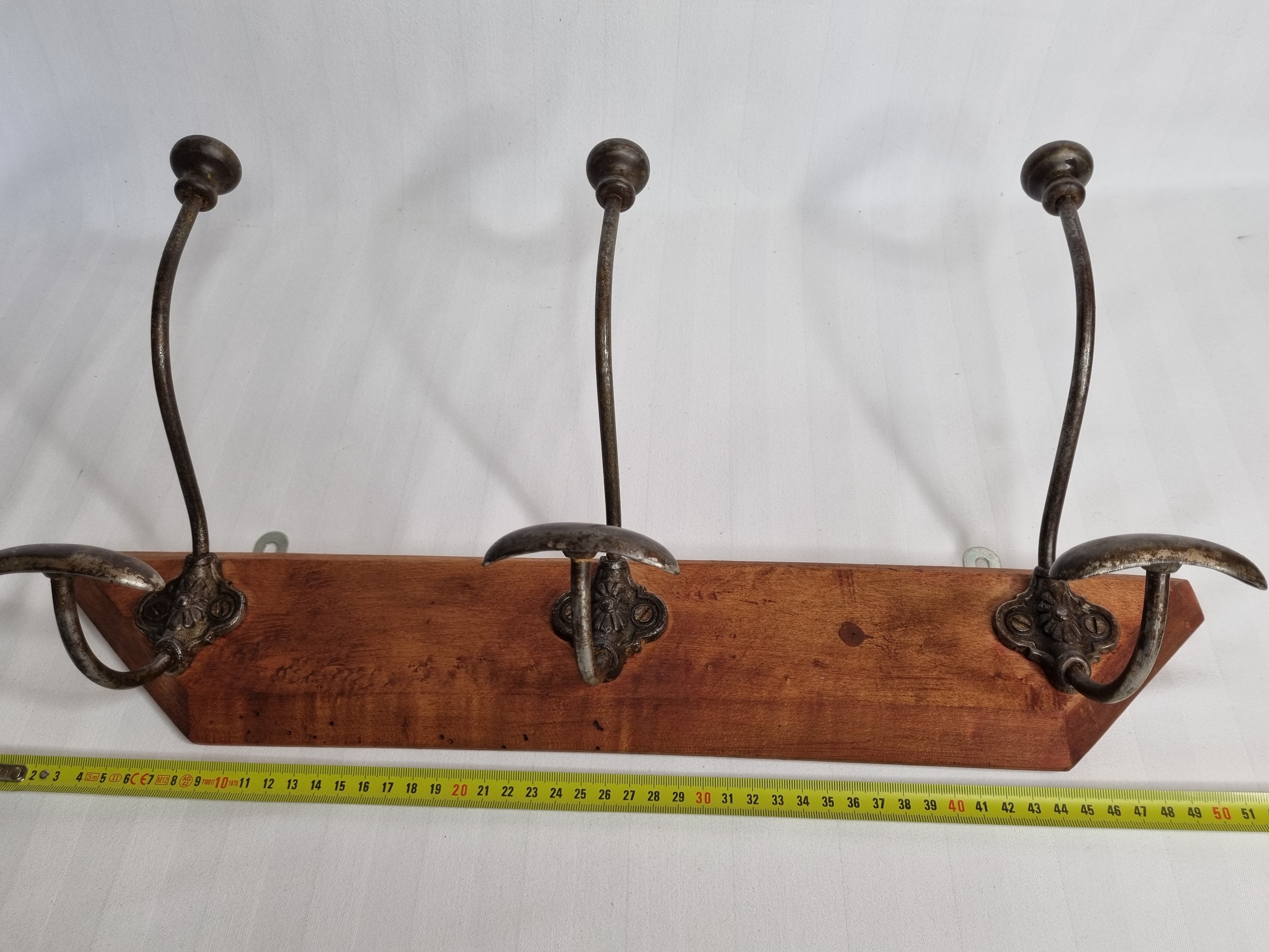 Wall rack "bistro" in metal and wood, 1900, 3 hooks