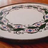 Porcelain and zinc trivet circa 1900