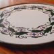 Porcelain and zinc trivet circa 1900