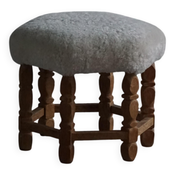 Mid-century Danish hexagonal oak stool with shearling lamb wool upholstery, 1950.