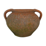 Old round jar with double handles. Year 70