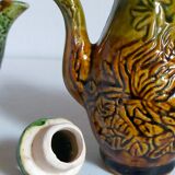 Set of old teapots and honey pot