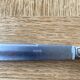 Art Deco silver metal leg of lamb cutlery