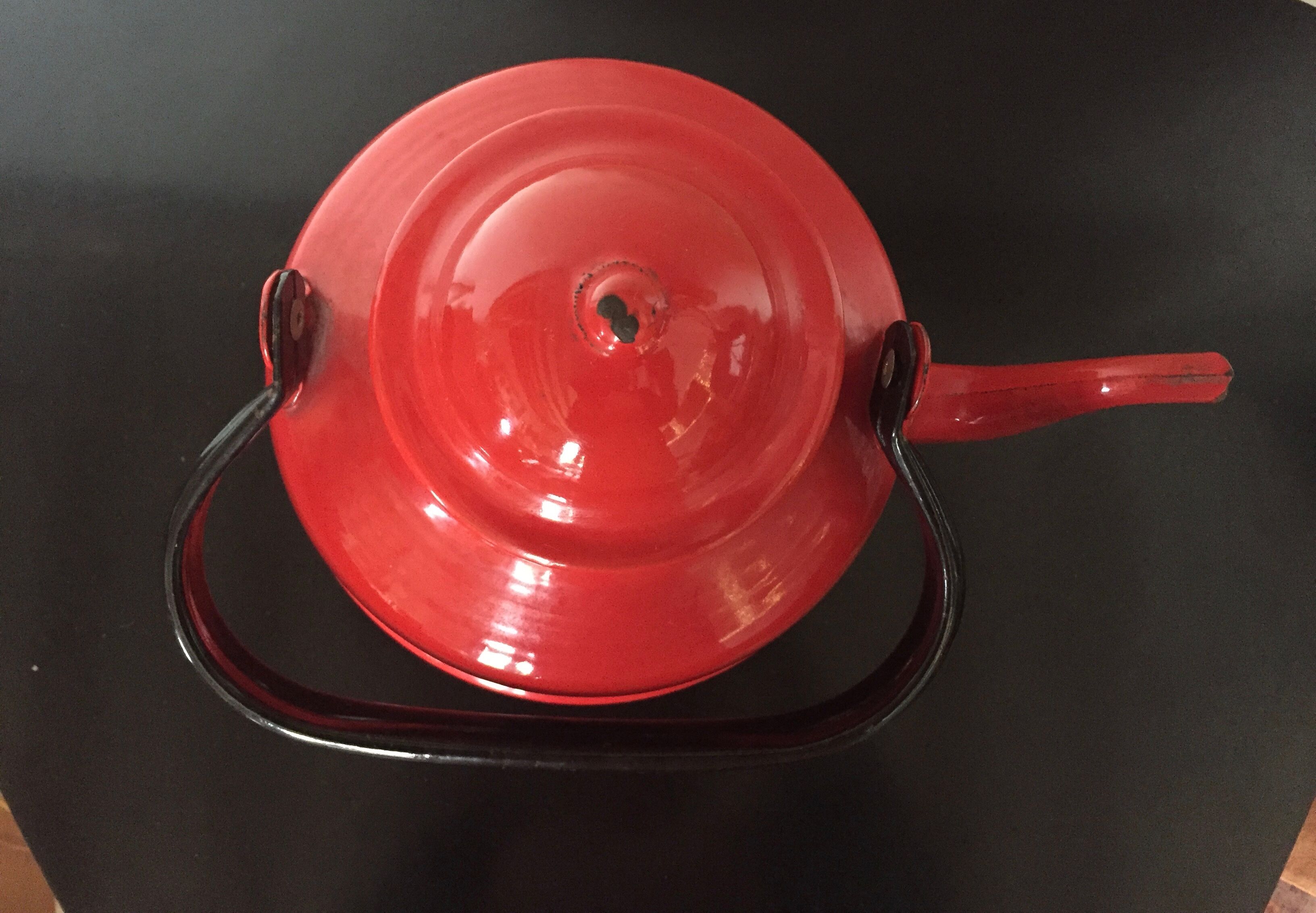 Red enamelled kettle
