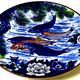 Decorative porcelain plate featuring a koi carp.
