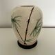 Vase signé décor bambous