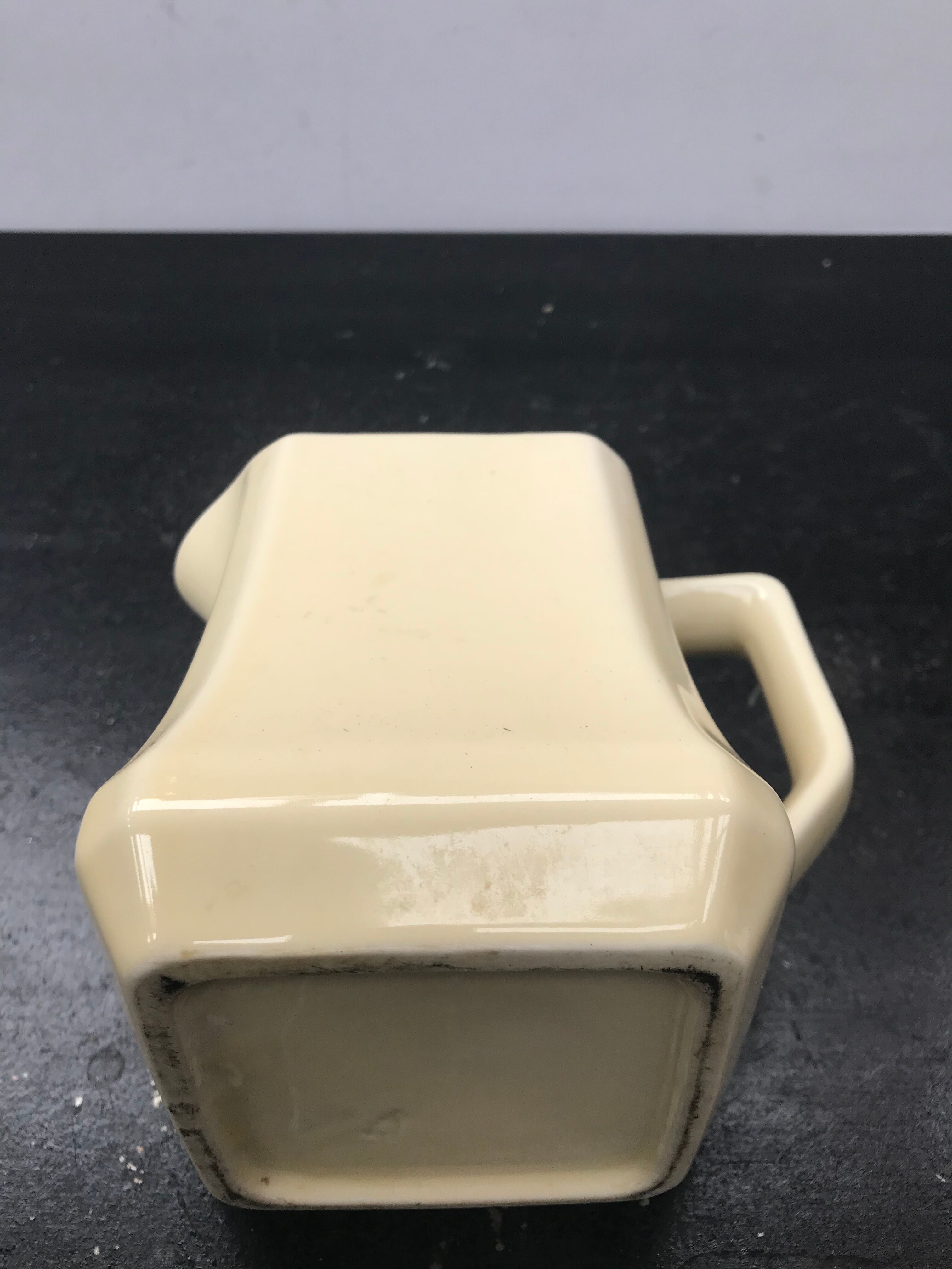 Former beige ceramic pitcher 70