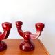 pair of burgundy enameled ceramic candlesticks / candelabras signed 1949