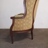 Fauteuil bergère médaillon Louis XVI en noyer tissus en petit point de croix