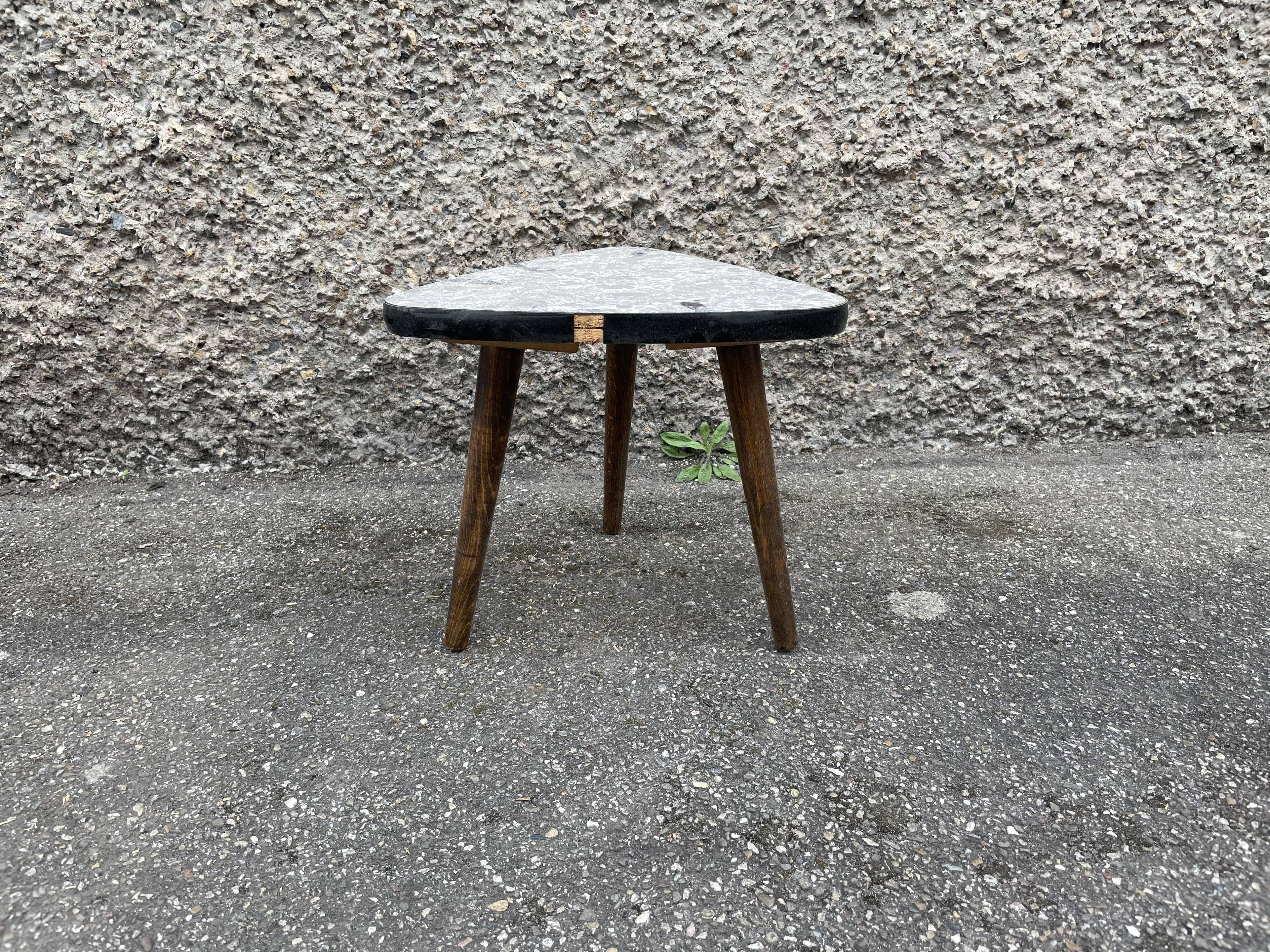 Small triangular table coffee table with a vintage tripod door midcentury plant 1950