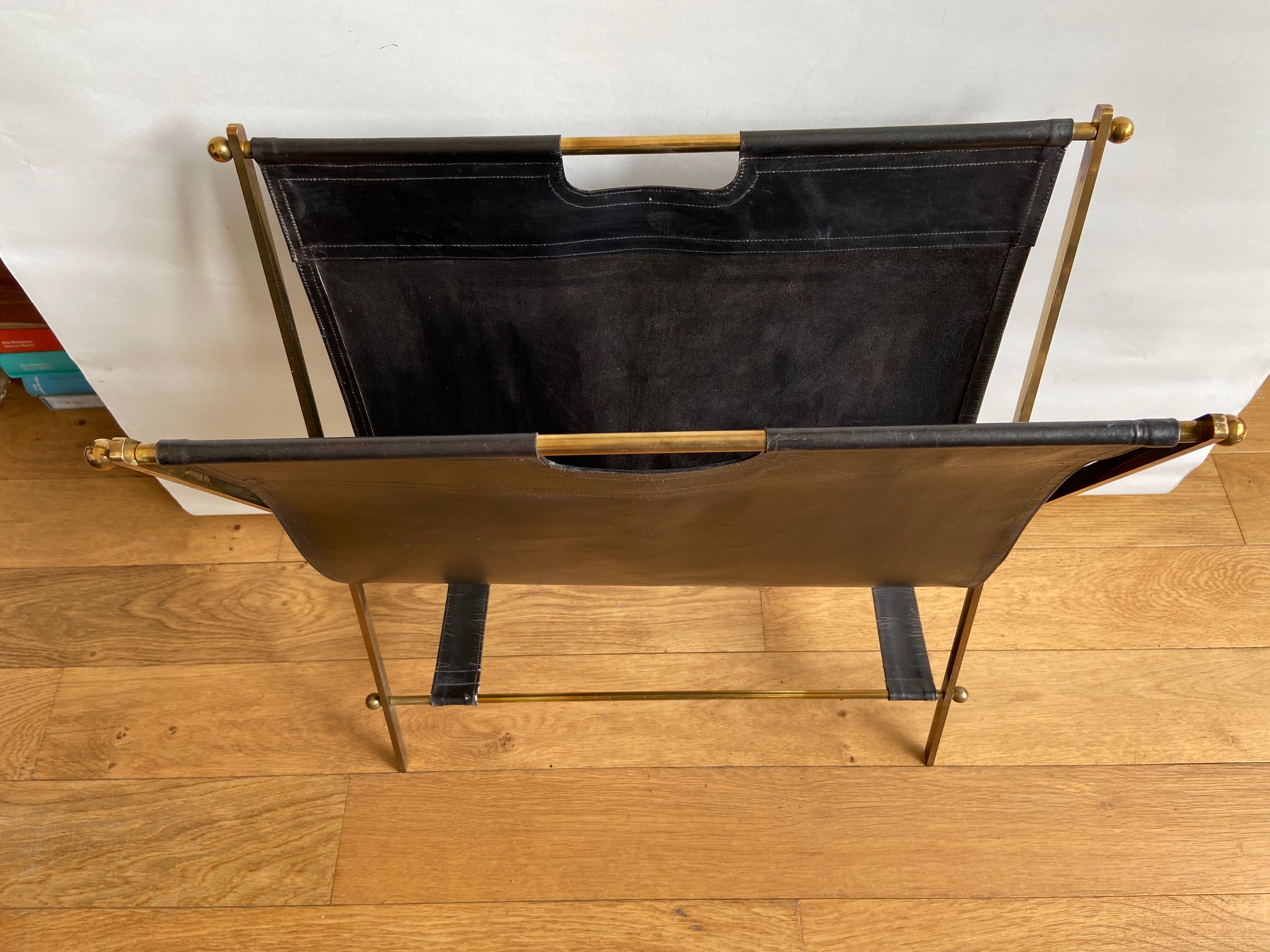 Leather and gilded brass magazine holder