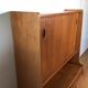 vintage sideboard with drawers and sliding doors