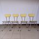 4 yellow Formica chairs