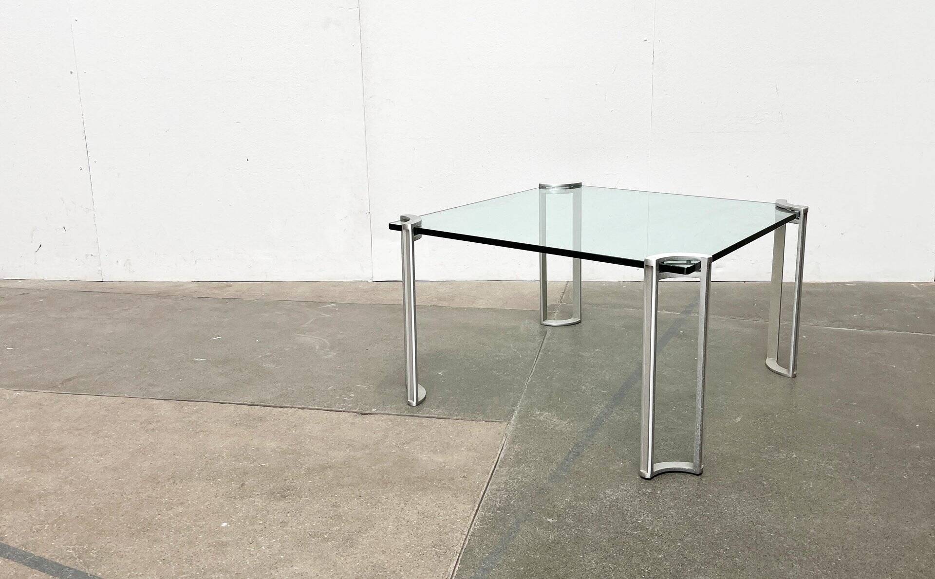 Vintage Space Age coffee table in glass and aluminium attributed to Peter Ghyczy, 1970s.