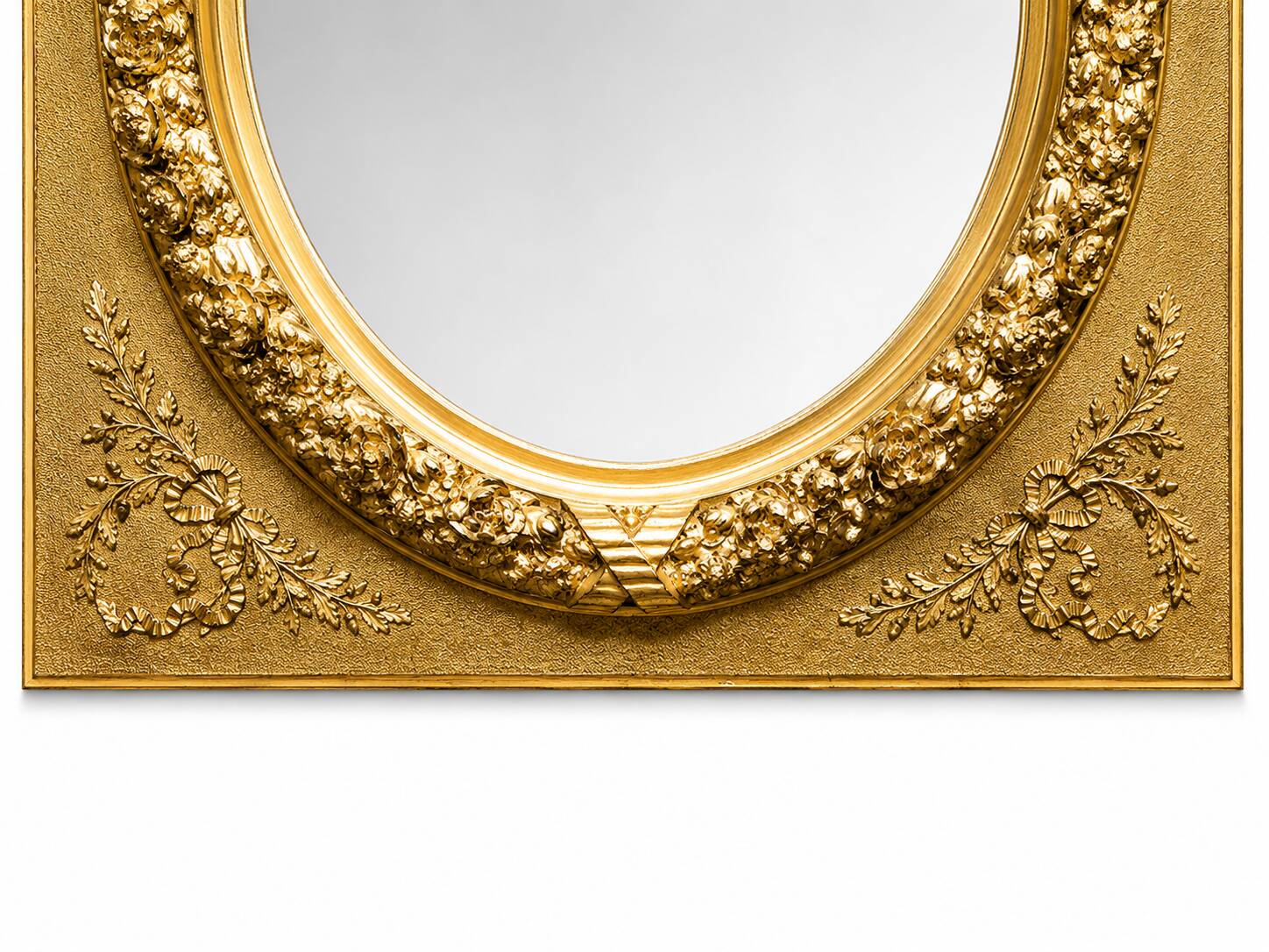 Large Louis XVI style mirror in gilded wood and composition – Early 20th century.