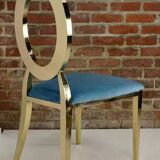 Gold chair with turquoise velvet seat