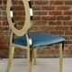 Chaise doré et assise velours turquoise