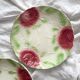 2 old slip plates decorated with roses