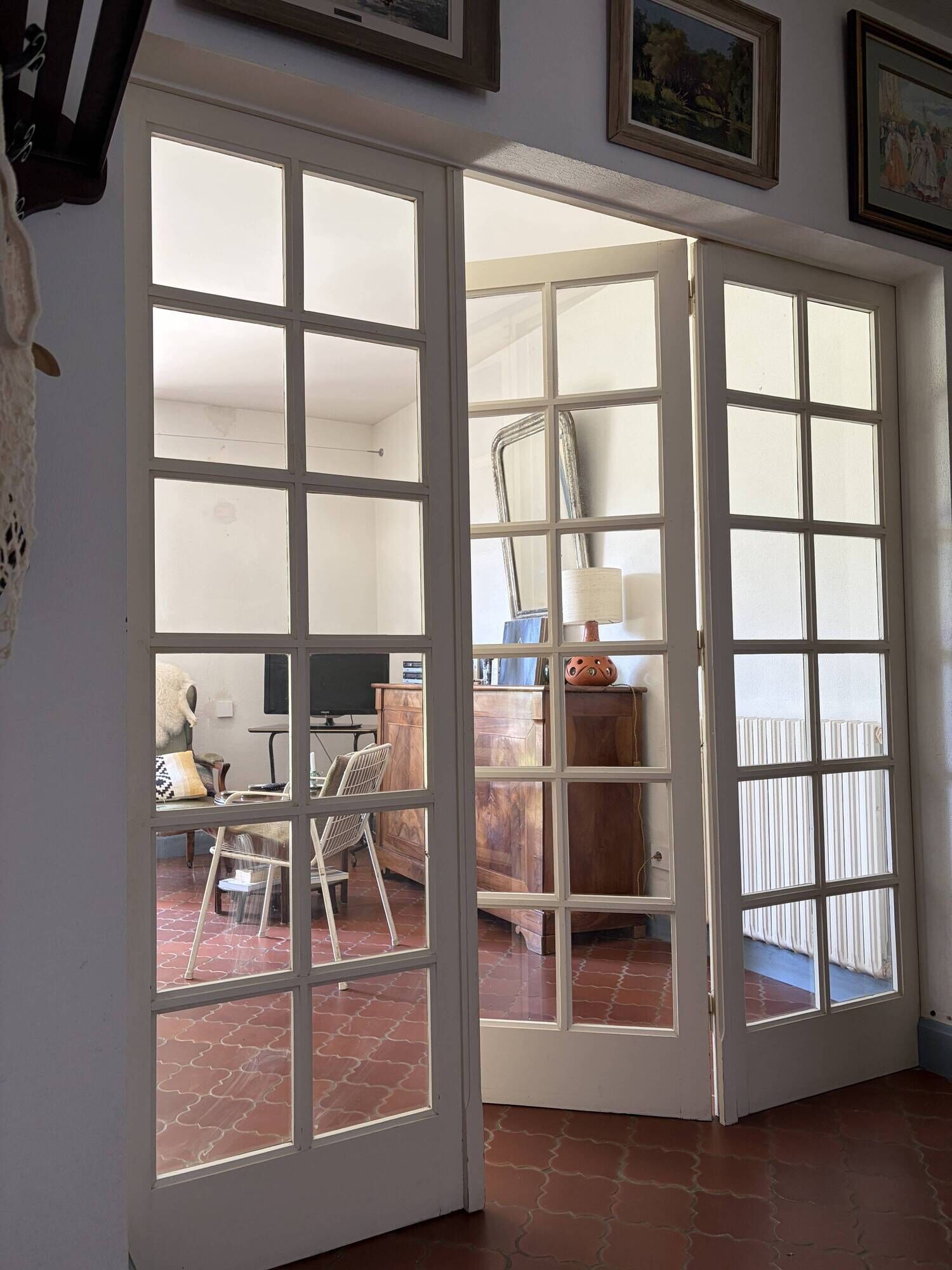 Triptych glass door with three panels featuring small panes. Vintage.