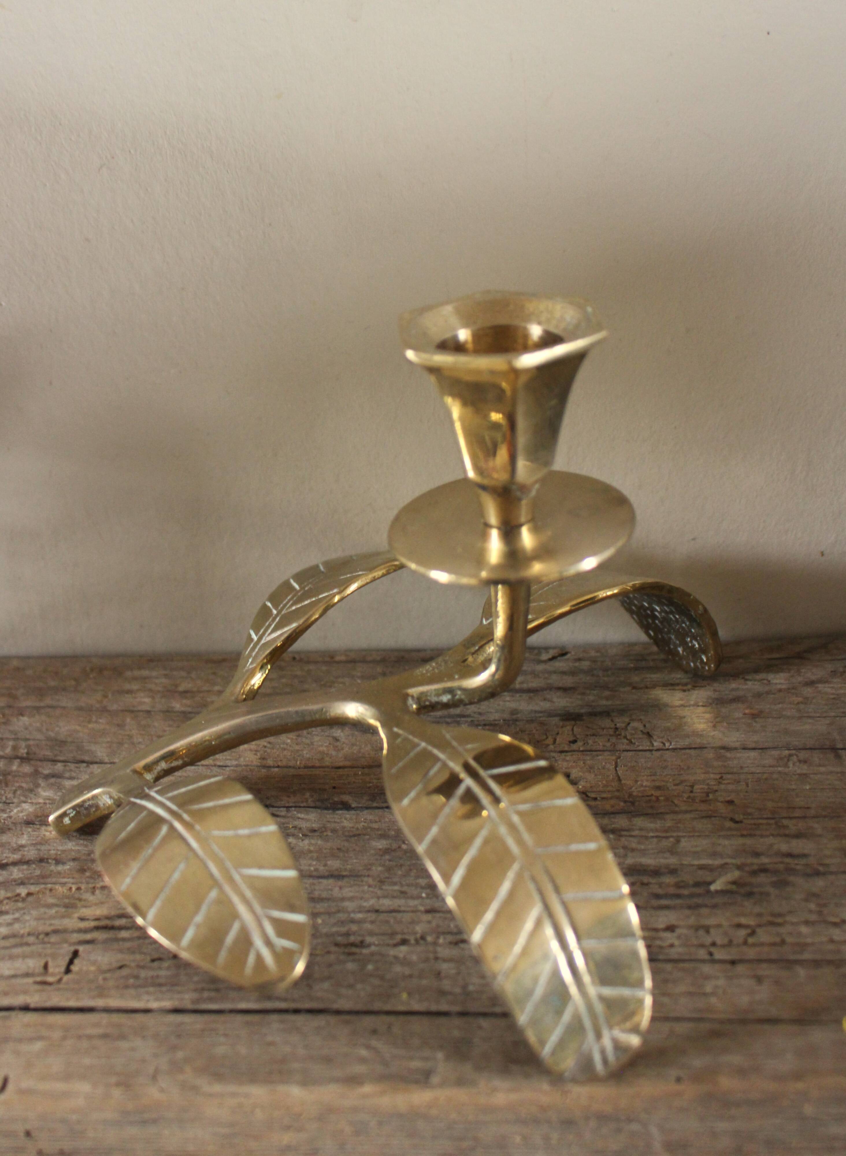 Brass candle holder with oval leaf branch