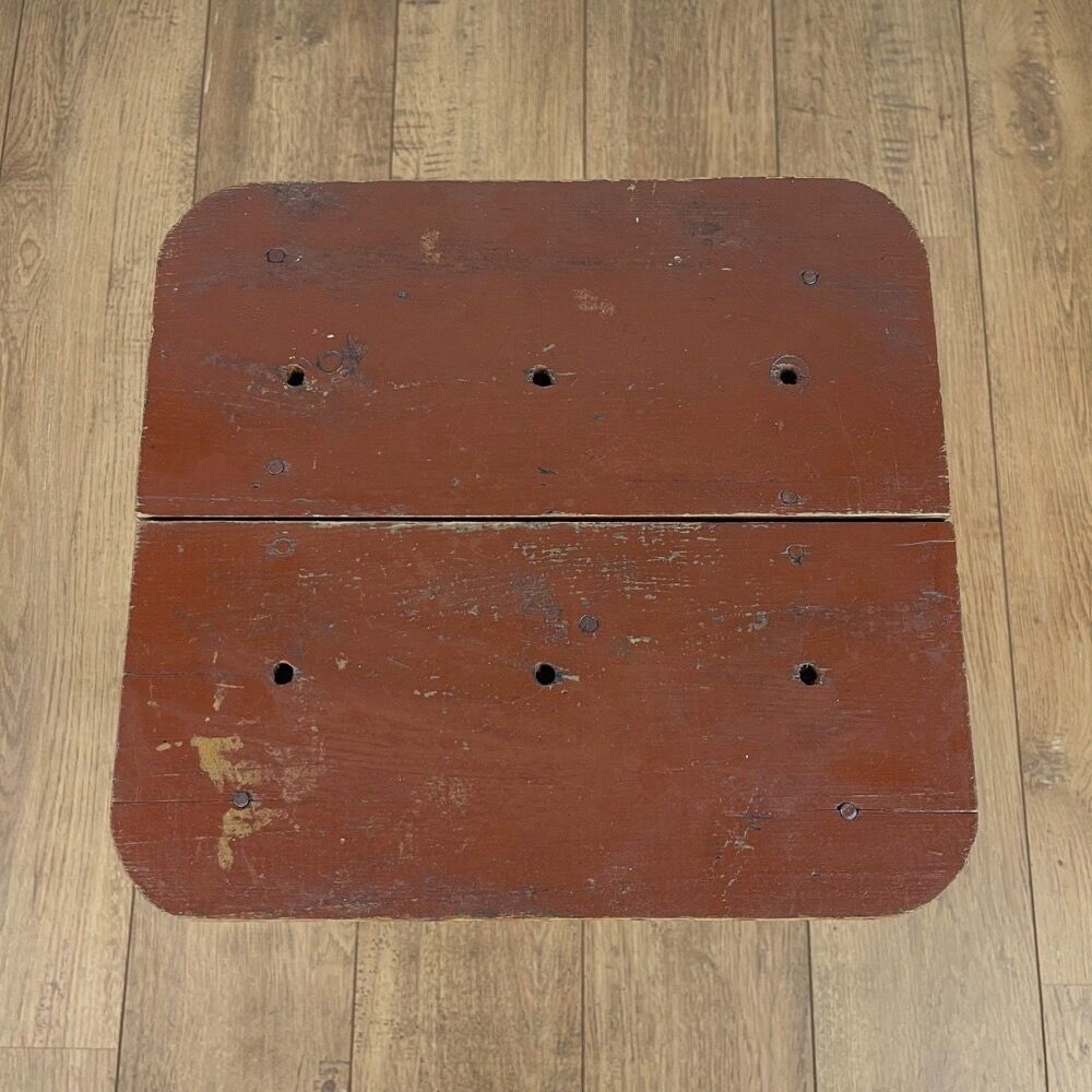 Old solid chocolate wooden stool