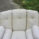 Pair of leather “space age” armchairs. Cream colour". Circa 1970.