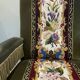 Paire de fauteuils en velours et tapisserie
