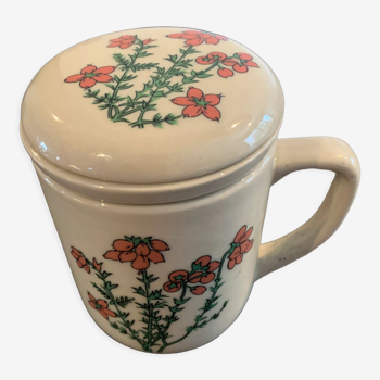 Herbal tea cup made in Korea with its tea filter and lid