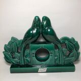 Decorative element with parakeets