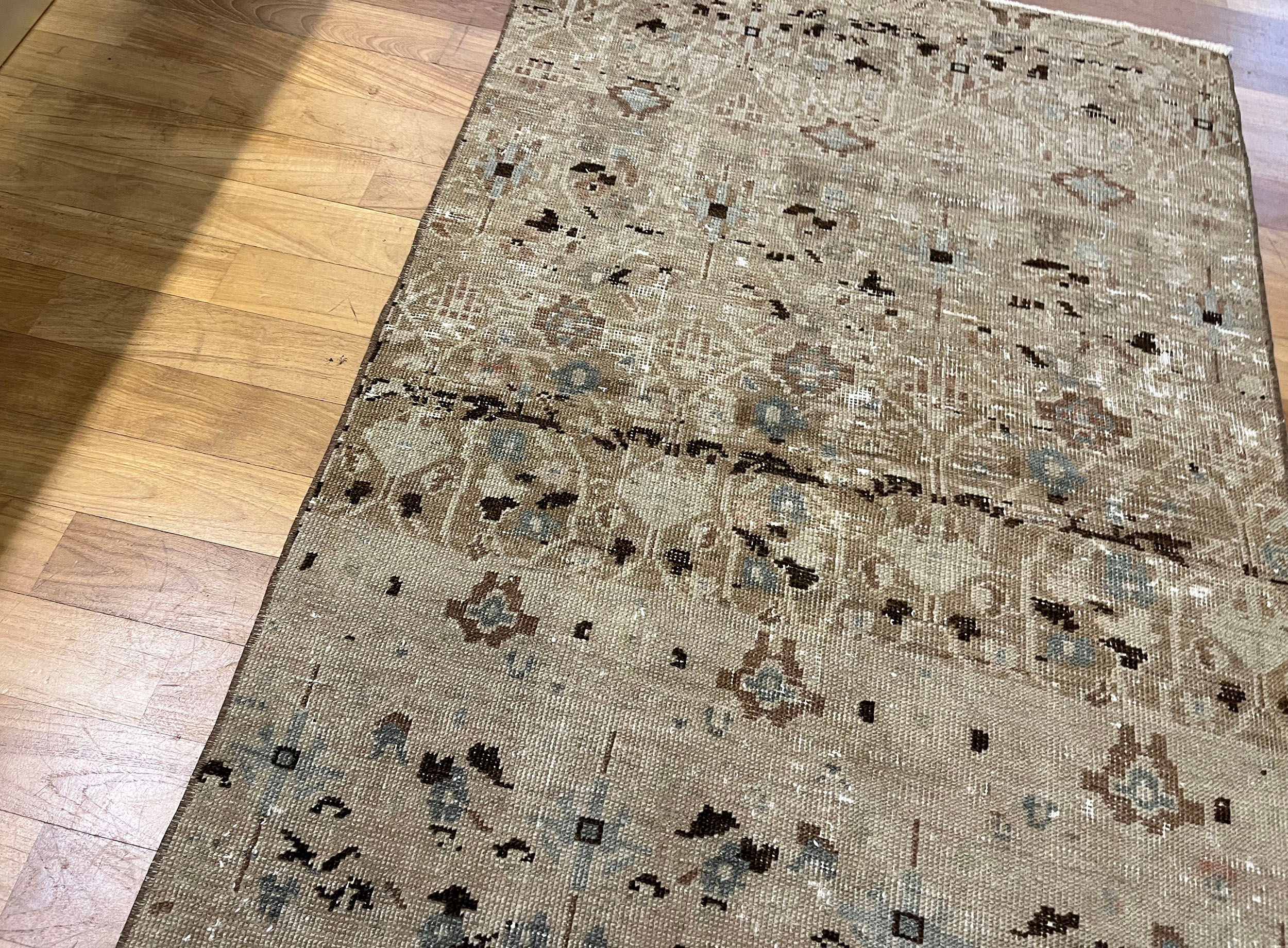 Unique aztec design muted handmade old rug