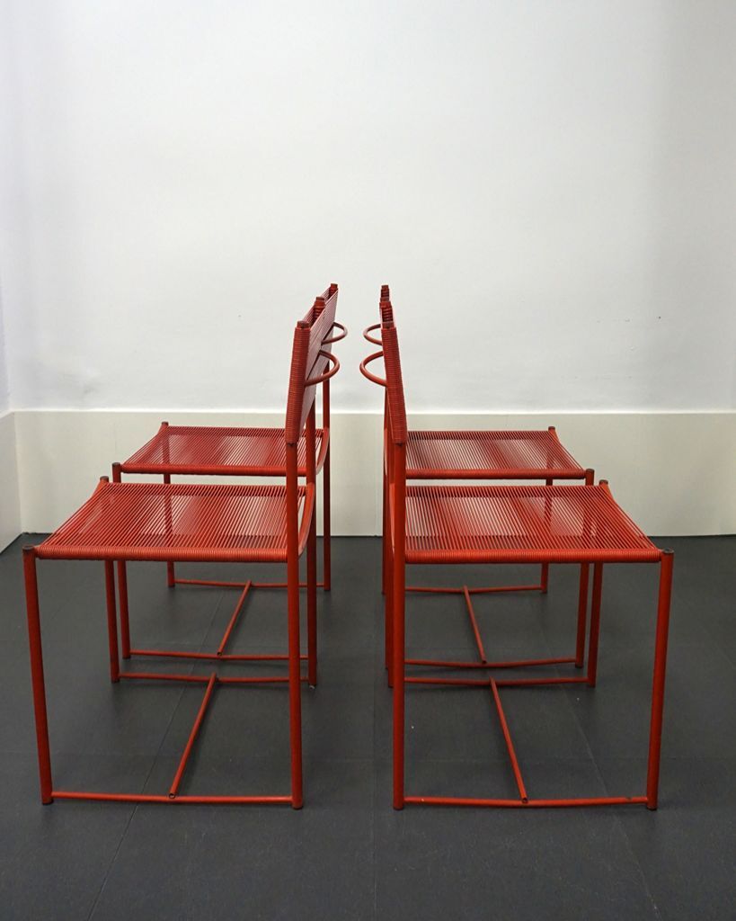 4 chaises rouges Spaghetti de Giandomenico Belotti pour Alias