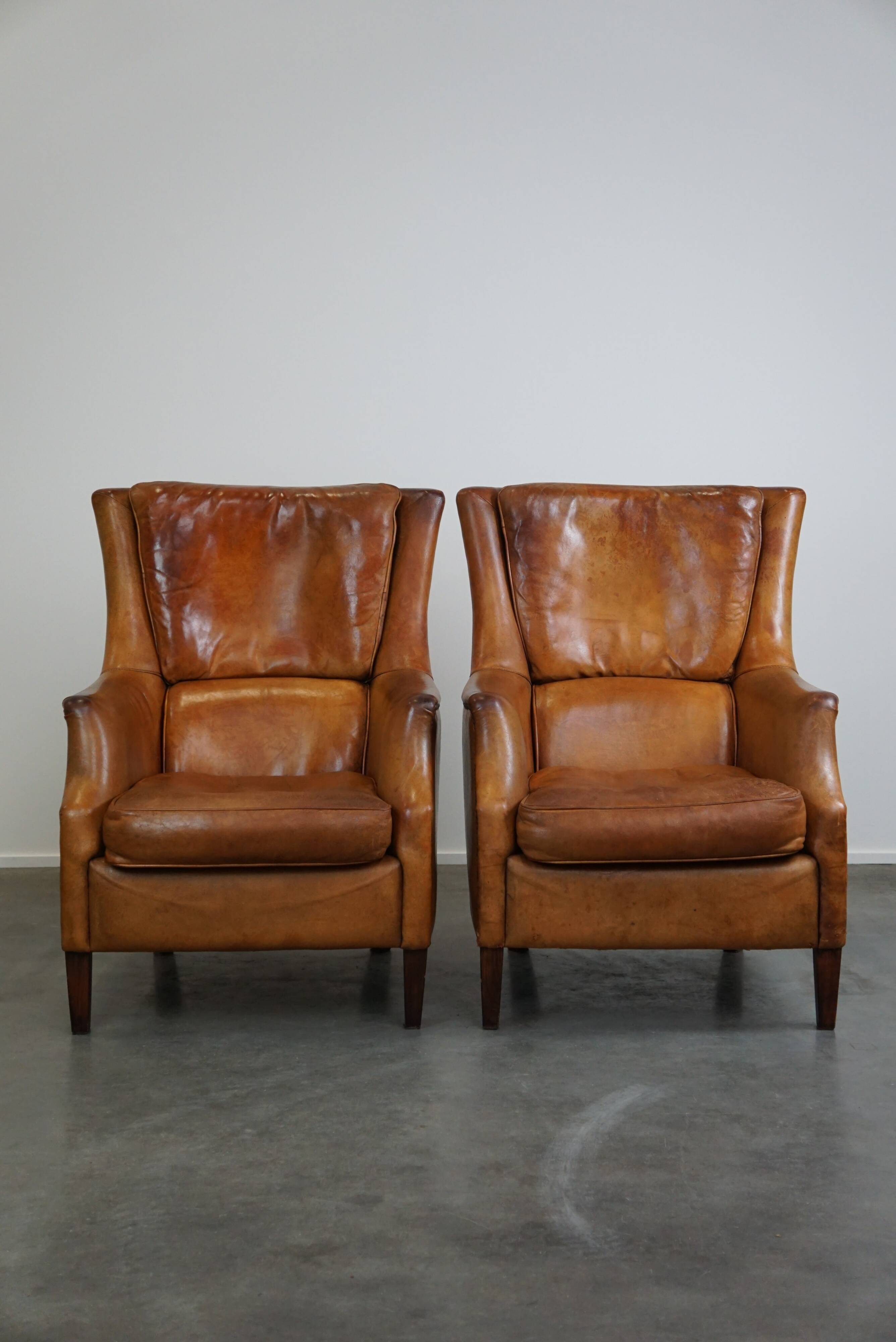 Set of two super rugged and very comfortable sheep leather armchairs