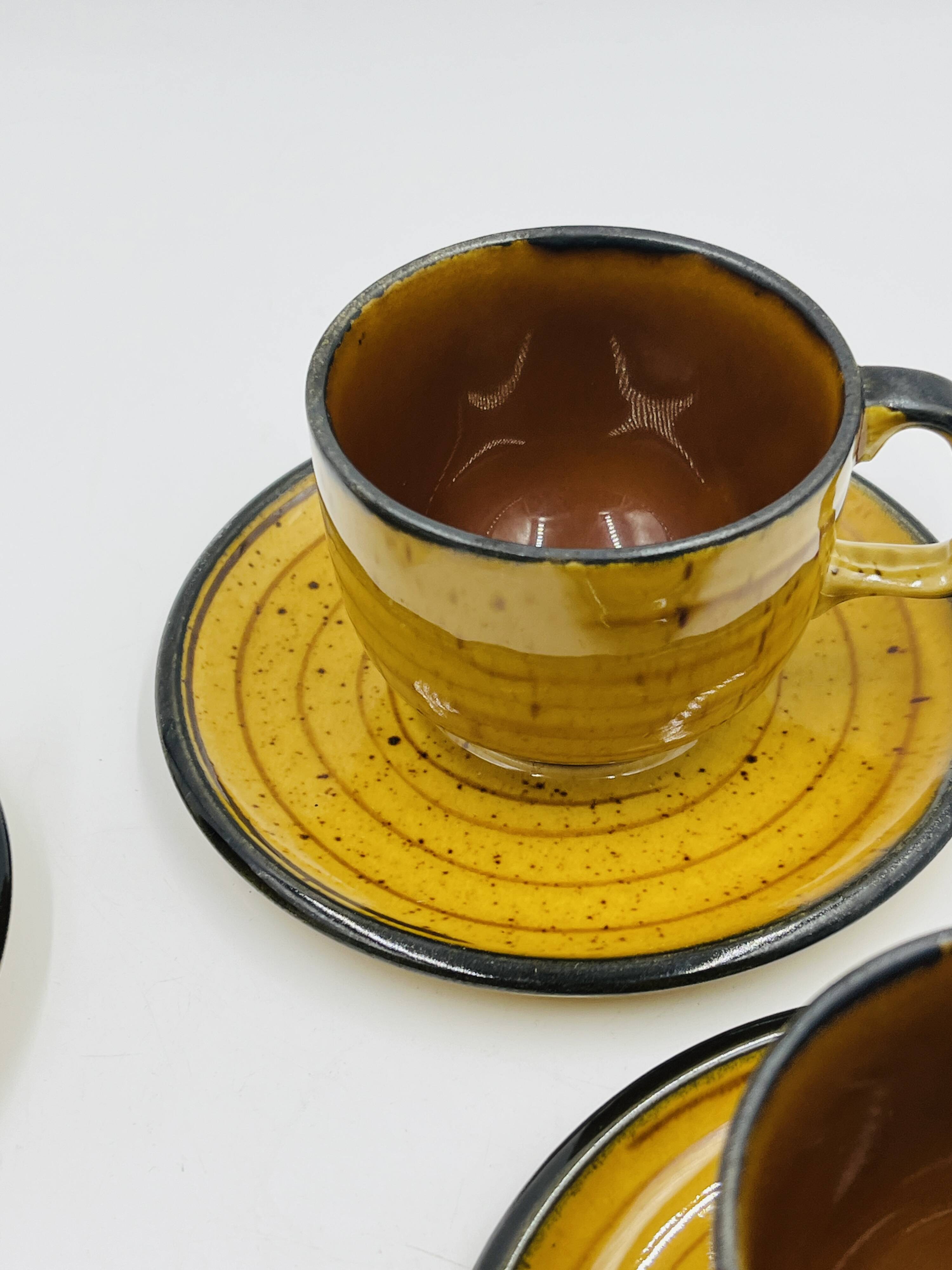 Set of four vintage Boch Palma cups and saucers.