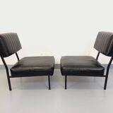 Set of 2 vintage modernist armchairs in black faux leather and metal.