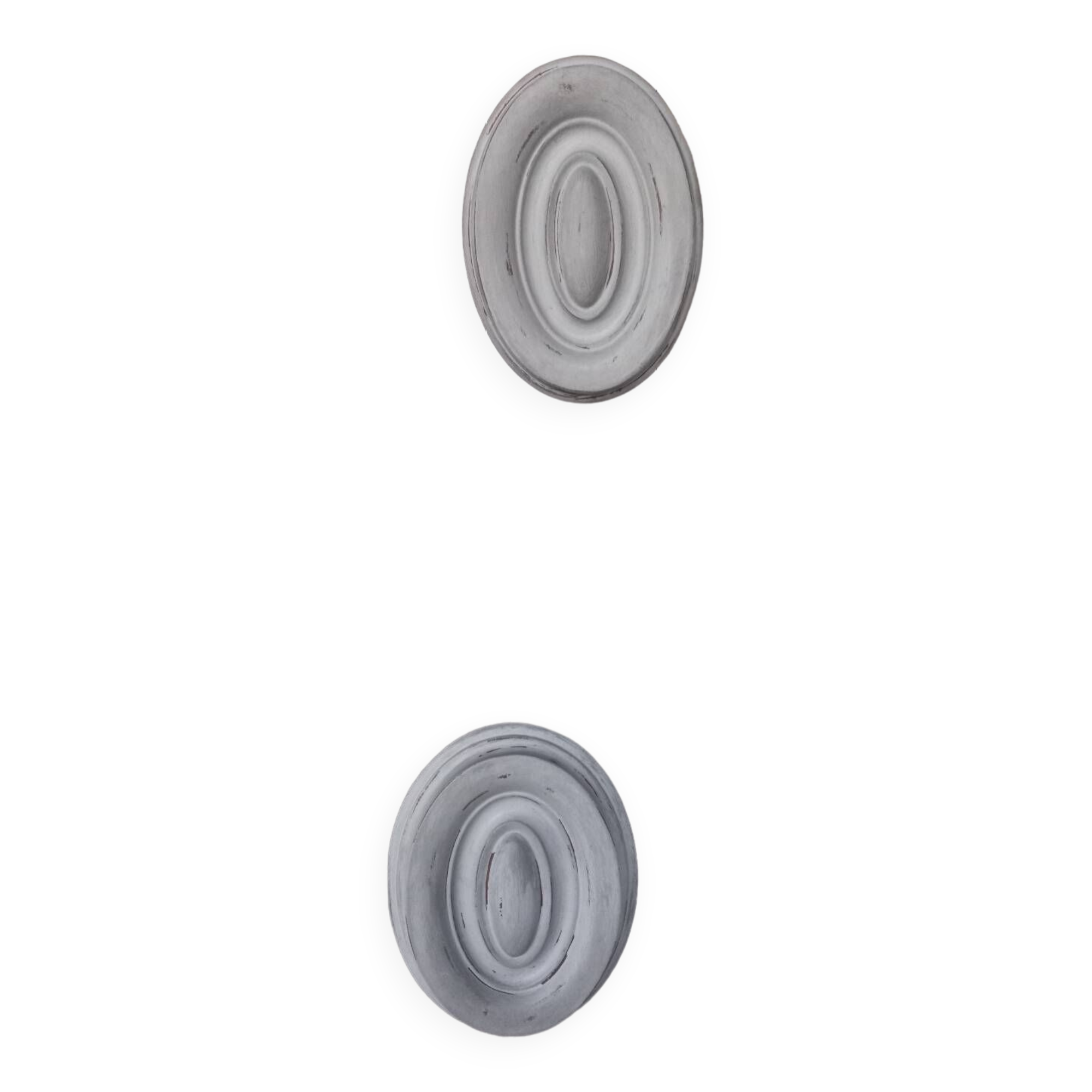 Pair of patinated oval woodwork